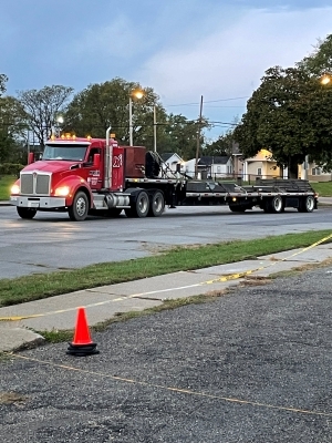Semi pulling a trailer.