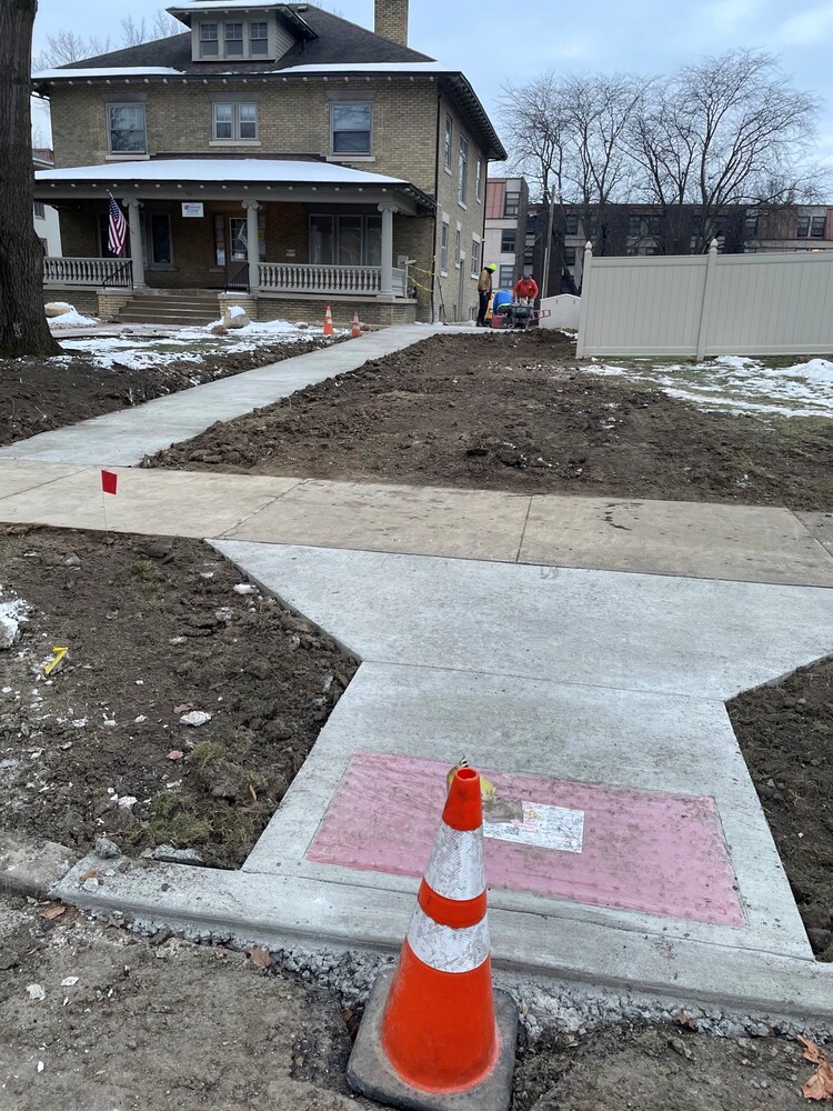 Sidewalk view of ADA Lift being installed.