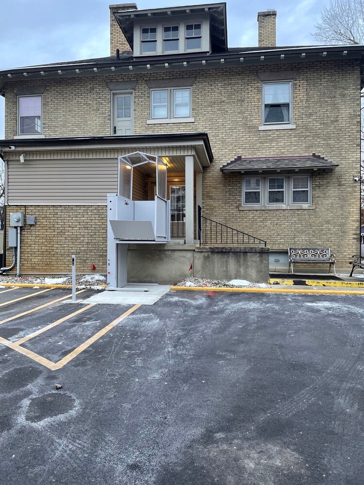 An ADA Lift attached to a building,
